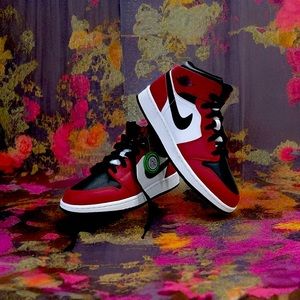 Pair of New in Box with StockX verification tag.  Kids Air Jordan 1.  Sz 5.5Y